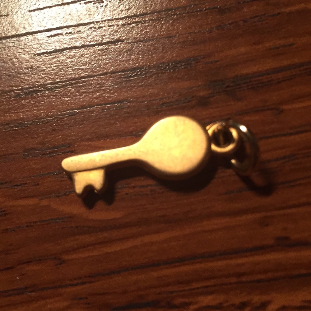 Gold key charm